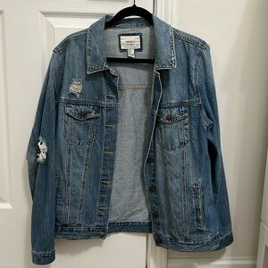 Distressed denim jacket